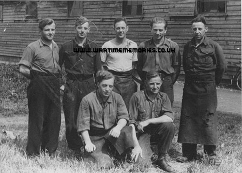 Doug (Centre back row) with Italian POWs outside billet